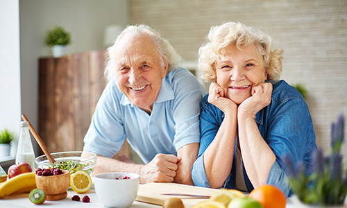 Health - Senior couple cooking