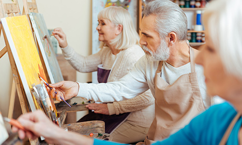 Older adults painting