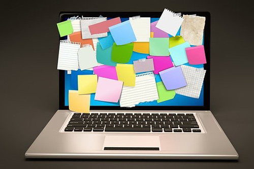 Using Google Keep & Other Google Tools Laptop covered in sticky notes