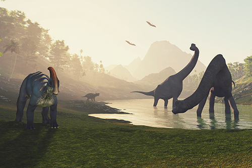 Dinosaurs in a valley, standing in water