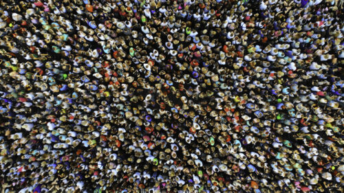 Big crowd of people. People gathered together in one place. Top view from drone. Big crowd of people. People gathered together in one place.