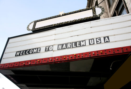"Close up of marquee sign in closed movie house on 125th Street, Harlem, New York City, NY, USA."