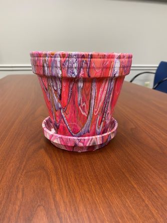 Sample of a planter that has been pour painted.