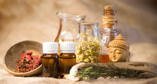 Herbal treatment concept with pomegranate flower, rosemary, ginger and golden rod, slidage,