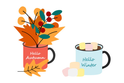 Set of 2 cups with autumn and winter lettering, a bouquet of autumn leaves and warm with marshmallow.