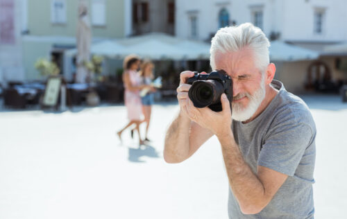 Senior Man Camera Photography Traveling Concept