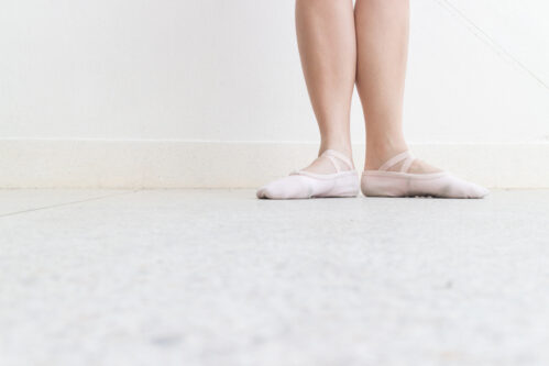 ballet first foots position on right frame on the street with point shoes ballet first foots position on right frame on the street with point shoes