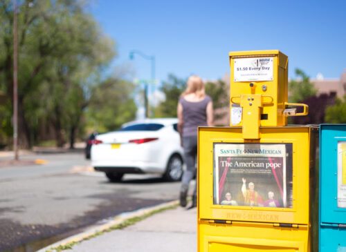 Santa Fe, NM: A Santa Fe New Mexican vending machine features a newspaper headline reading "The American pope,” a day after Pope Leo XIV was elected.